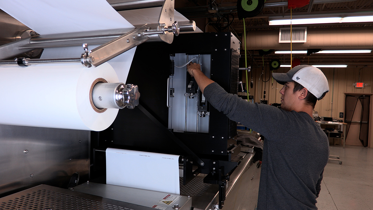 Print technician servicing an InteliJet TSX Traverse